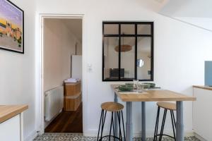 Appartements La parenthese sous les toits : photos des chambres