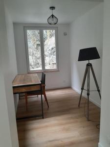 Appartements Appartement 75m2 plein centre face a la mairie : photos des chambres