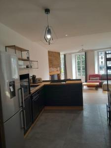 Appartements Appartement 75m2 plein centre face a la mairie : photos des chambres