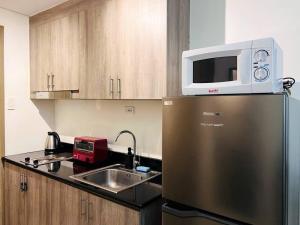 1BR Condotel with Balcony at FAME Residences #FM12