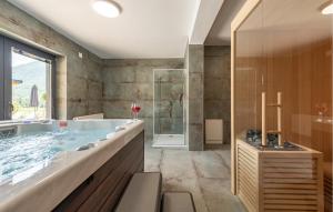 Nice Home In Rizvanusa With Sauna 