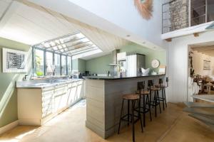 Charmante maison dans venelle fleurie