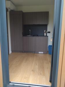 Maisons de vacances Au coin des Lilas - Studio 1 : photos des chambres