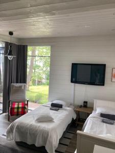 Moderni rantasauna ja -mökki