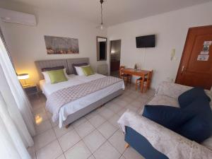 Elenis Apartments Igoumenitsa - Γκαρσονιέρα 2ου ορόφου επιπλωμένη, εξοπλισμένη