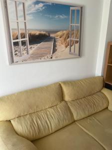 Bajo con jardín en primera línea de playa