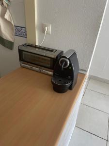 Bajo con jardín en primera línea de playa