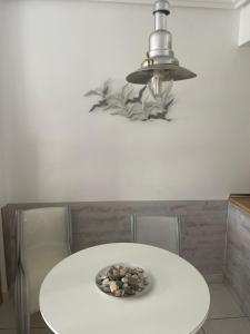 Bajo con jardín en primera línea de playa