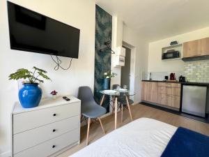 Appartements Studios Izicozy I Confort et jardin en ville, proche gare I 2 et 4 pers : photos des chambres