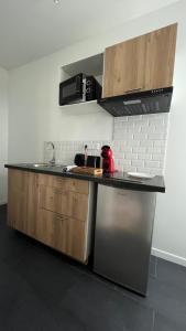 Appartements Studios Izicozy I Confort et jardin en ville, proche gare I 2 et 4 pers : photos des chambres