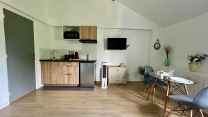 Appartements Studios Izicozy I Confort et jardin en ville, proche gare I 2 et 4 pers : photos des chambres