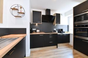 Appartements Appartement L'Oriel avec Parking : photos des chambres