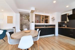 Appartements Appartement L'Oriel avec Parking : photos des chambres