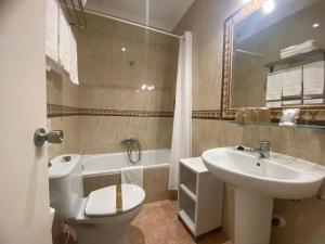 Double Room with Extra Bed - Ground Floor room in Hotel Los Jazmines