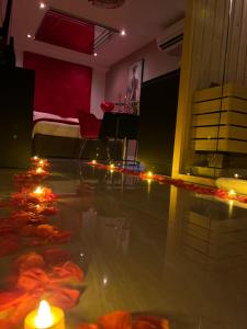 Love hotels ELEGANCE & SPA - chambre d'hotes avec sauna et jacuzzi privatif : photos des chambres