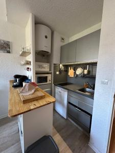 Appartements Le petit Marou : photos des chambres