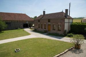 Maisons de vacances Le bas du buisson ferme : photos des chambres