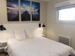 Appartement 2 chambres, balcon, piscine chauffée, accès plage, animaux admis, parking - FR-1-194-194