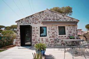 Maisons de vacances Gite coquet en pierre : photos des chambres