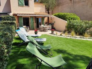 Maisons de vacances Joli gite les palmiers iii : photos des chambres