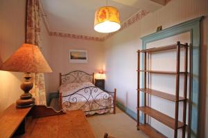 Maisons de vacances Le jardin : photos des chambres