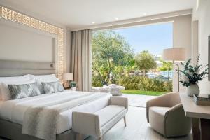 One Bedroom Suite Private Garden Pool View room in Porto Sani