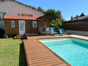 Chalets Chalet de jardin, piscine : photos des chambres