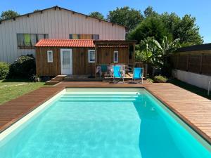 Chalets Chalet de jardin, piscine : photos des chambres