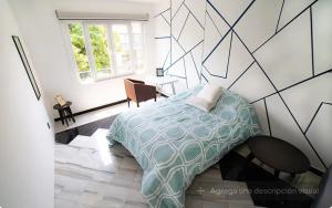 Gold 13 Cama Matrimonial y Baño Compartido