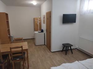 Suterénní pokoj v Penzionu Kubu