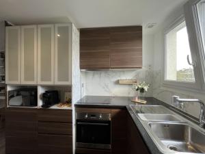 Appartements Entire 60m2 apartment - Close to Paris - Parking - Kitchen - 2min RERB - Olympic-24 : photos des chambres