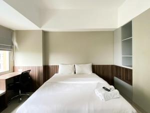 Modern Look and Tidy Studio Gateway Park LRT City Jatibening Apartment By Travelio