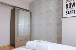 Homey and Cozy 1BR Apartment at Braga City Walk By Travelio