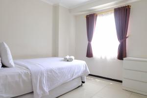 Spacious 3BR at Gateway Pasteur Apartment By Travelio