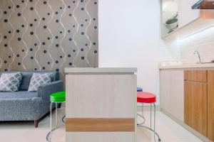 Nice and Elegant 2BR at Transpark Cibubur Apartment By Travelio