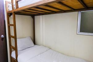 Homey 2BR at Suites @Metro Apartment By Travelio