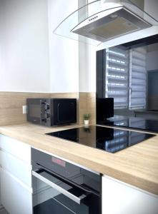 Appartements La Longue Vue-Appart vue mer avec balcon-parking : photos des chambres