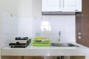 Good Deal 2BR at 16th Floor Suites @Metro Apartment By Travelio