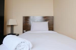 Best Location 2BR at Braga City Walk Apartment By Travelio