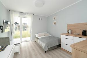 Stylowe Studia z Tarasem w Poznaniu by Noclegi Renters