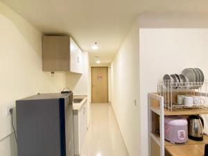 Cozy Living and Strategic 2BR at Meikarta Apartment By Travelio