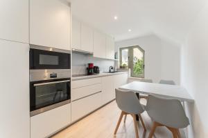 Marlie s Home - comfort stadsapp met zonnig terras