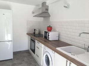 Appartements Appartement avec terrasse et vue mer : photos des chambres