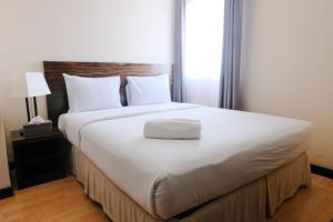 Homey 3BR Apartment at Braga City Walk By Travelio