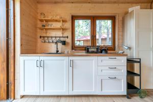 Zakątek Wdzydze z widokiem na jezioro -domek nr 19