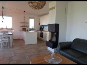 Wippezogel - Ferienhaus mit Sauna, Kamin und Meerblick