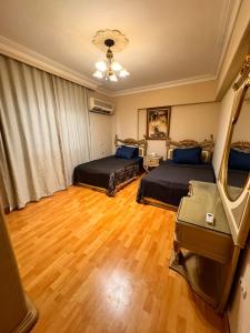 Classic double room in Al-Saraya Home - Séjours chez l'habitant, Le Caire