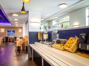 Hotels ibis budget Paris Porte De Montmartre : photos des chambres