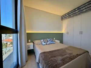 Excelente apartamento em Bombas com piscina