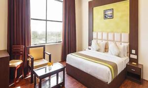FabHotel Prime Rester Select